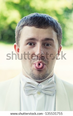Funny portrait of groom