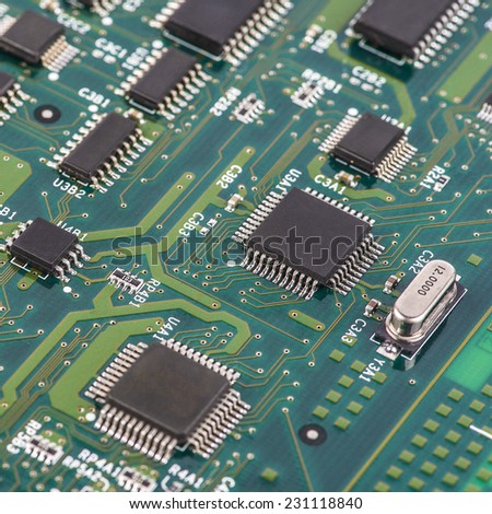 Detail of electronic board. Close-up of electronic circuit board with processor