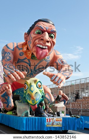 NICE, FRANCE - FEBRUARY 26: Carnival of Nice in French Riviera. This is the main winter event of the Riviera. The theme for 2013 was King of the five continents. Nice, France - Feb 26, 2013