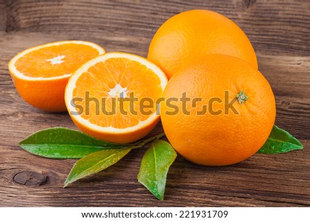 Orange Fruits on old wooden background