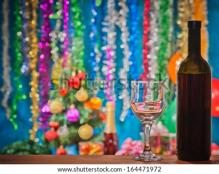 New Year\'s decoration and a bottle of of wine