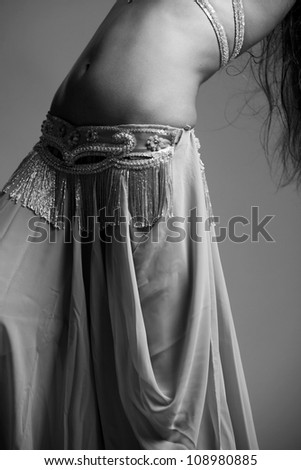 Art photo of beautiful young body of the belly dancer