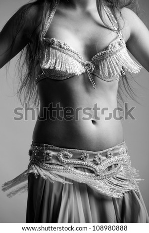 beautiful young body of the belly dancer