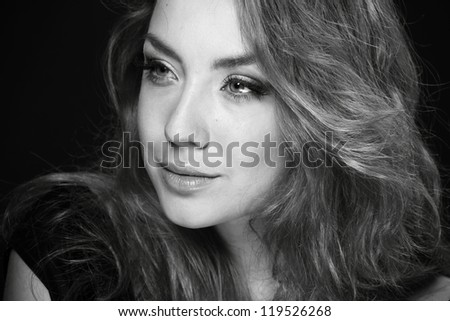 Black and White image of beautiful elegant blonde woman close up portrait
