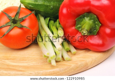 Studio image of organic vegetables over light background on Food and Drink theme/Healthy eating with vegetable background