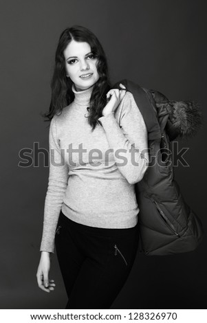 Black and white picture fun woman in winter clothes