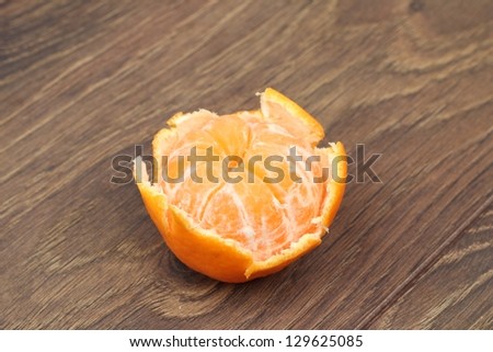 Mandarin on dark wooden background/Natural vitamin C for health and beauty