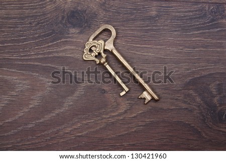 Vintage keys pattern/Antique metal keys on dark wooden background