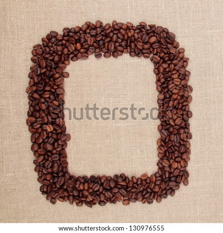 Natural Brazilian coffee beans on  light  background on Food and Drink