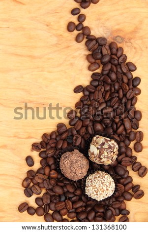 raw coffee beans and chocolate sweets