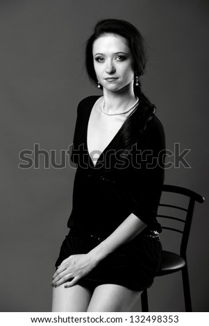 Black and White image of cute woman on Beauty and Fashion
