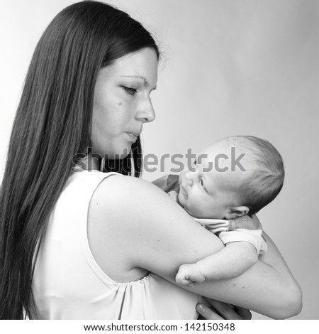 Black and White Art image of mother holding baby boy/Tender mother love