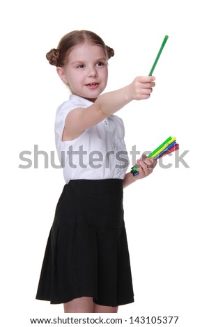 Image of beautiful sweet little girl holding felt tip pens on Education concept theme/Cheerful schoolgirl wearing white blouse and black skirt and holding lots of colorful felt tip pens