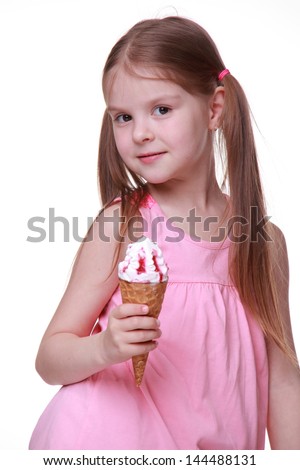 European young model with funny two tails and holding sweet ice-cream