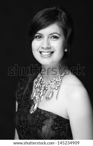 Black and white art portrait of an elegant young woman
