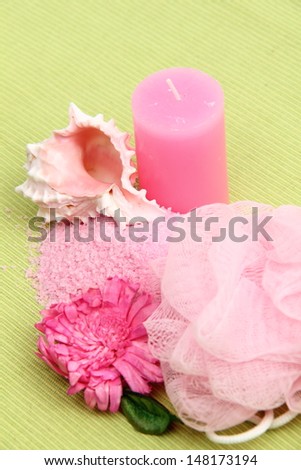 Image of pink spa candle and pink sea salt/Spa objects