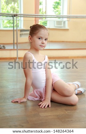 Adorable little ballerina in pink tutu