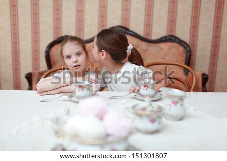 Little English ladies drinking tea on Food and Drink