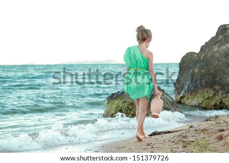 Little Greek goddess on the beach