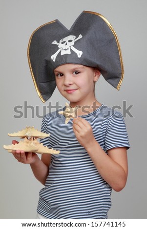 Caucasian cute little child in the costume of the pirate on Holiday