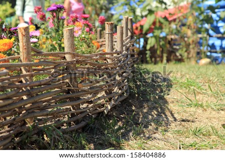 Ukrainian national fence/Ukrainian village in the summer