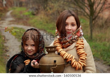 Two russian little girls at russian village
