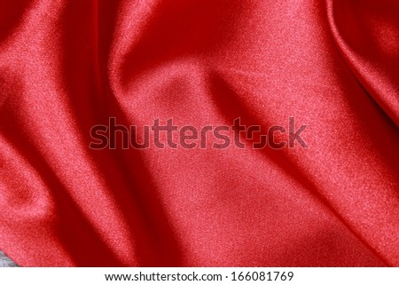 Smooth elegant red satin can use as background/Red satin background