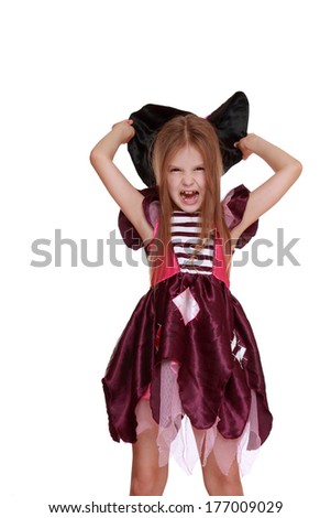 Portrait of little girl in black hat and black clothing with broom on white background/Halloween kid over white background