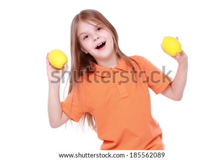 funny little girl with lemons