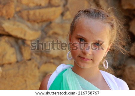 Beautiful elegant girl a Greek-style antique  dreams/Young girl in a role of the Greek goddess of outdoors
