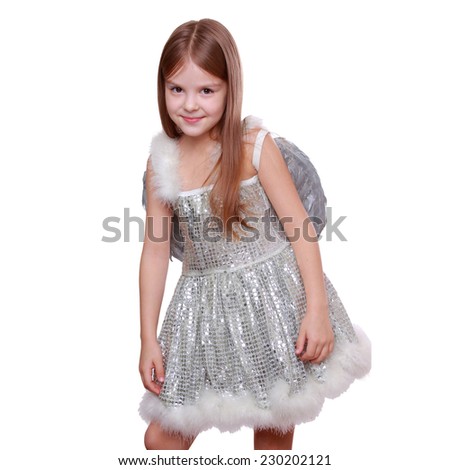 Studio image of silver little angel isolated on Christmas/Little fairy angel with magic wand laughing - isolated with copy space