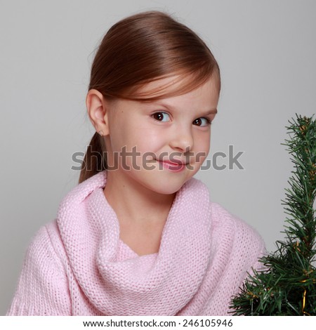 child in a knitted dress
