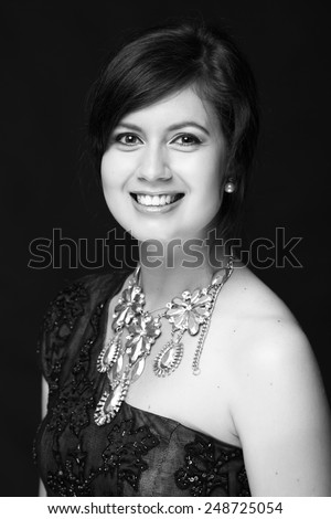 Black and white art portrait of an elegant young woman with beautiful hair on Beauty and Fashion