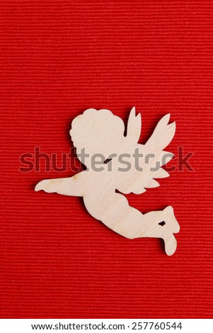angel silhouette over red background