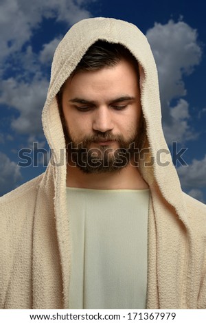 Portrait of Jesus praying outdoors