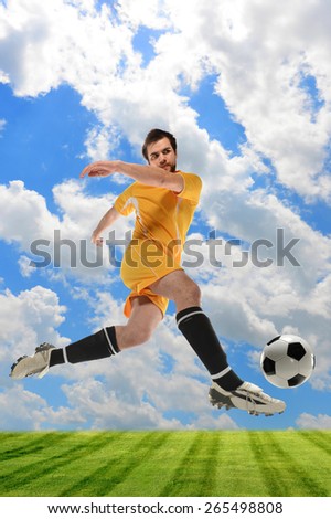 Young soccer player in action outdoors