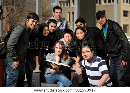 Group of diverse students inside college campus