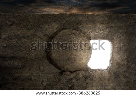 Tomb of Jesus with light coming out of opening