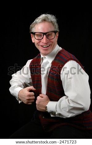 Older man expressing joy and confidence over a black background