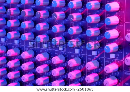 Sound mixer buttons with strong colored light.