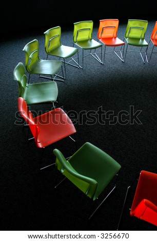 Empty Meeting Room with chairs arranged in circular pattern