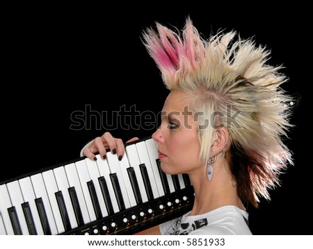 Profile of beautiful musician with key-tar isolated over a black background