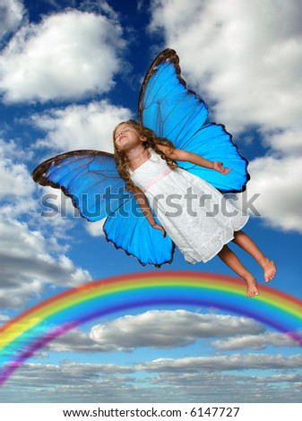 Fairy flying above the rainbow