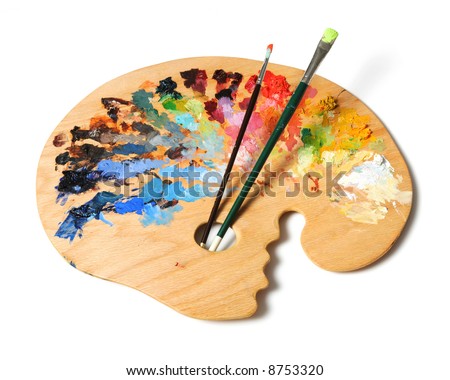Ergonomic artist's palette with brushes isolated over a white background Ergonomic artist's palette with brushes isolated over a white background