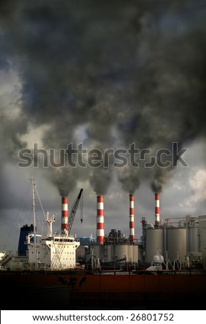 Industrial complex with smokestacks blowing pollution into the air