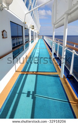 Side deck of cruise ship during sunny day