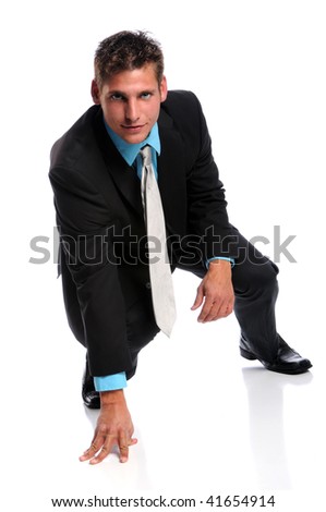 Businessman at starting line isolated over white background