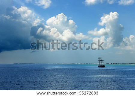 Pirate ship sailing on Caribbean waters in the Cayman Islands