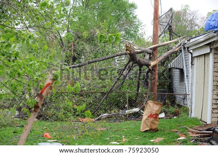 SAINT LOUIS, MISSOURI - APRIL 23: Damaged homes with tarp-covered roofs after tornadoes hit the Maryland Heights area on Friday April 22, 2011 in Saint Louis, Missouri.