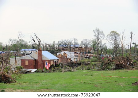 SAINT LOUIS, MISSOURI - APRIL 23: Damaged homes show tarp-covered roofs after tornadoes hit the Bridgeton area on Friday April 22, 2011 in Saint Louis, Missouri.